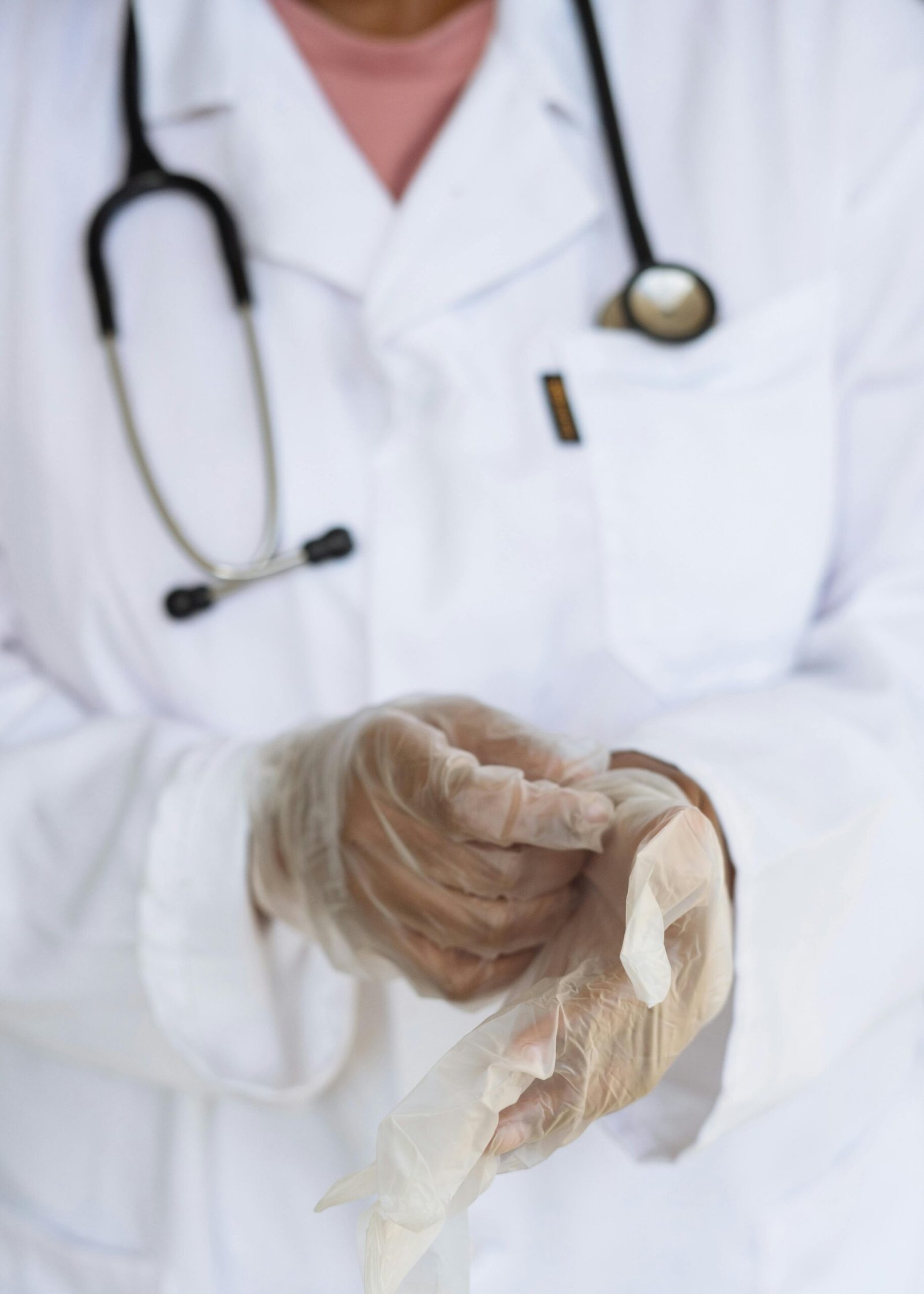 doctor putting gloves on